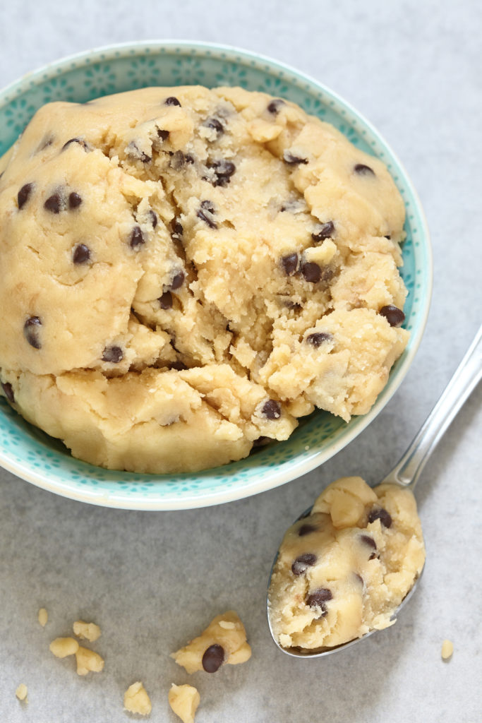 Sweet cookie dough with chocolate chips on a table